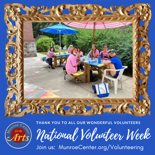 National Volunteer Week photo of summer camp staff having lunch